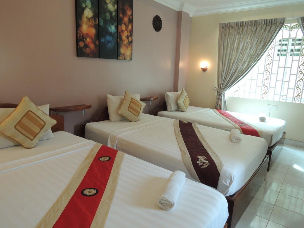Fancy Guesthouse Phnom Penh Quarto foto