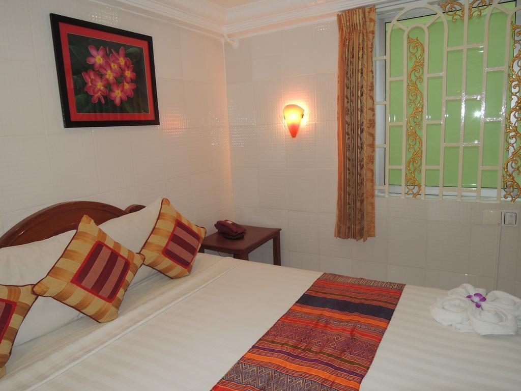 Fancy Guesthouse Phnom Penh Quarto foto